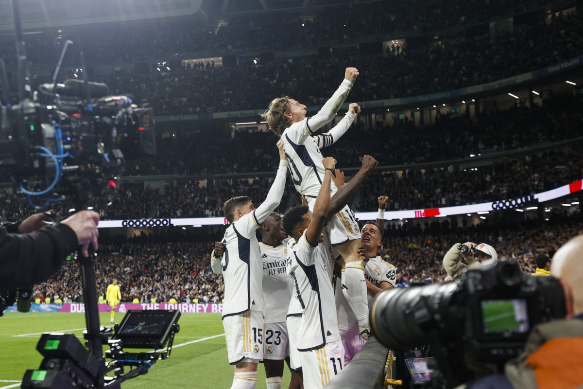 MADRID, 02/25/2024.- Real Madrid midfielder Luka Modric (above) celebrates after scoring against Sevilla, during the League match between Real Madrid and Sevilla FC this Sunday at the Santiago Bernabéu stadium.  EFE/Javier Lizón