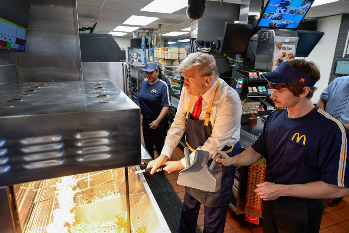 Trump cooks fries at McDonald’s and claims without evidence that Harris never worked at one
 –